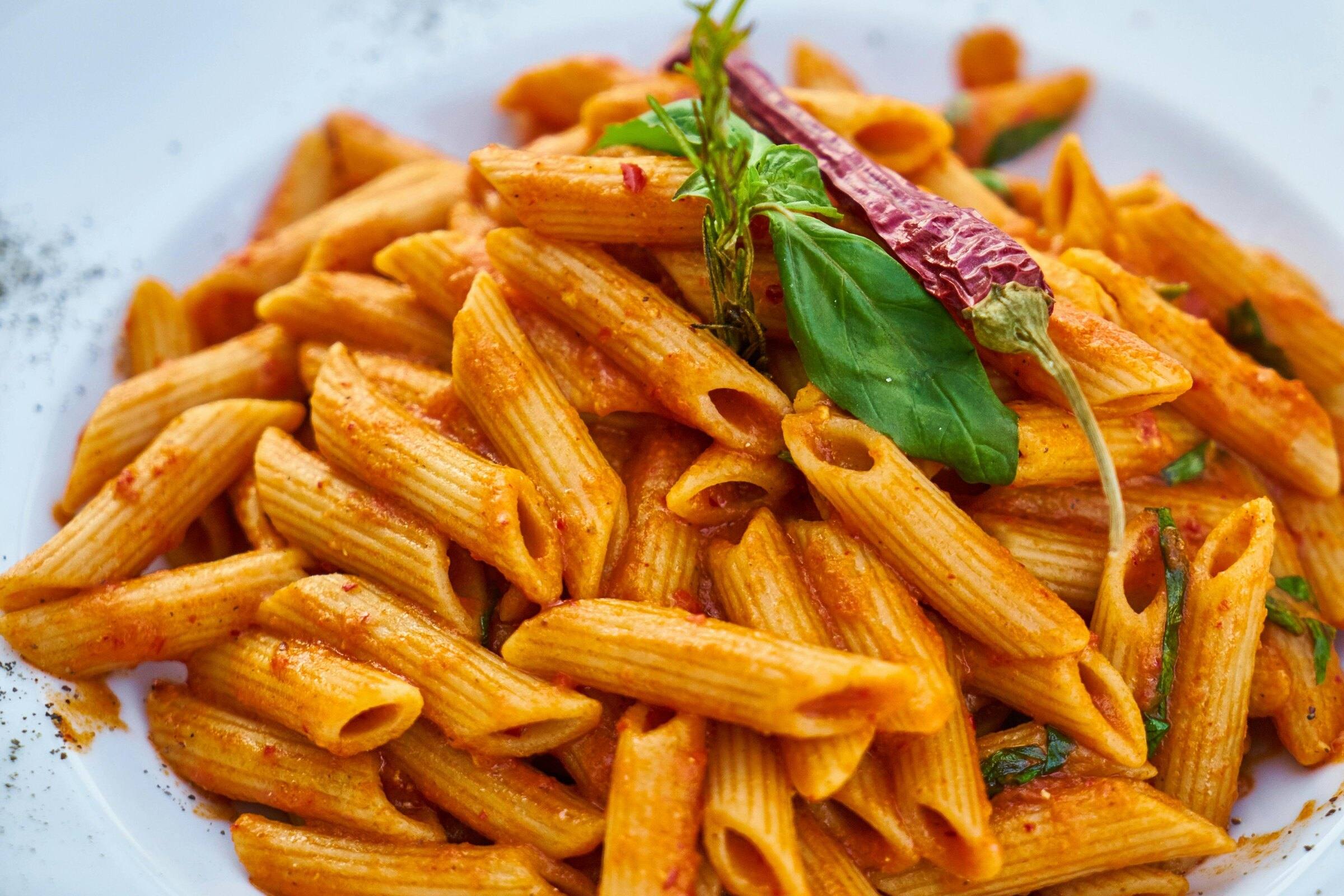 Penne in a spicy tomato sauce with basil and chilli